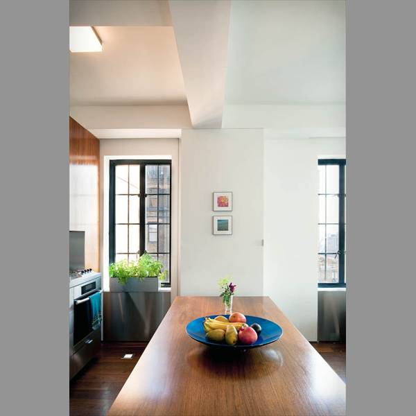 wall and murphy bed stowed away to enlarge the apartment